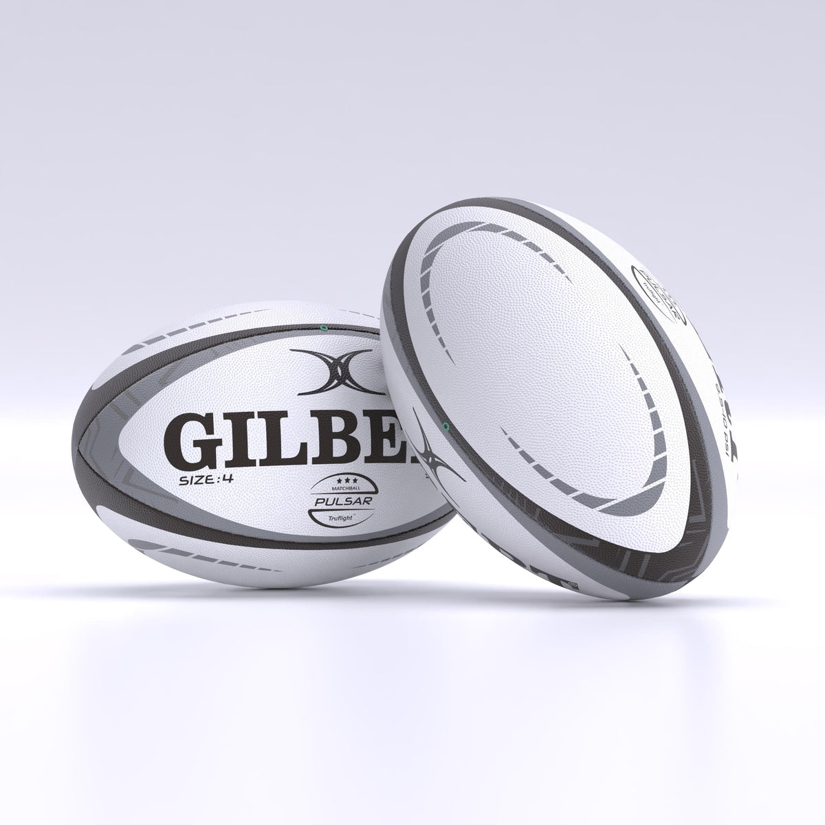 Two white and gray Gilbert Pulsar Match Rugby Balls, hand stitched to meet World Rugby specs, rest on a clean light surface—one upright, the other leaning gently against it.