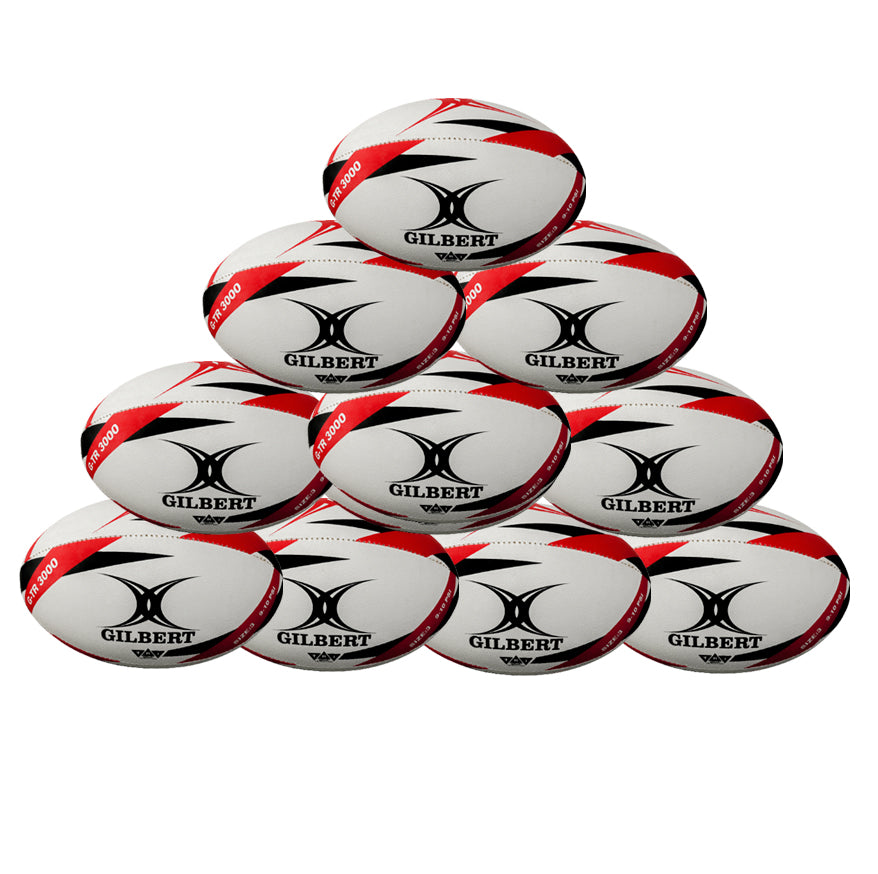 A pyramid stack of ten Gilbert G-TR3000 Training Balls by Gilbert, displaying red and black accents and Hydratec technology, shown against a plain white background.