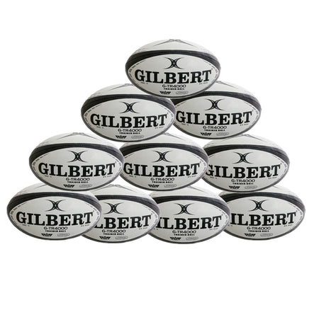 Ten black Gilbert G-TR4000 Rugby Balls from Gilbert are stacked in a pyramid shape against a white background, each branded with “GILBERT” and featuring Tri Grip Technology. Available as a convenient ten pack.