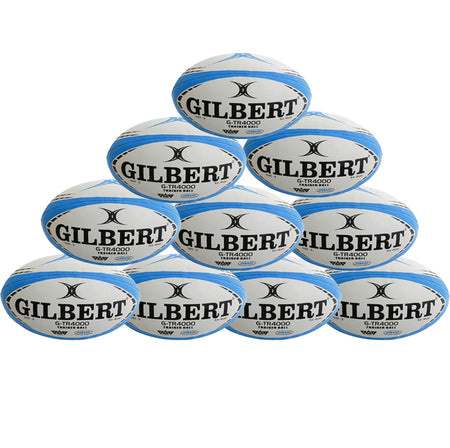 A pyramid stack of ten sky-colored Gilbert G-TR4000 rugby balls, each featuring the Gilbert logo and Tri Grip Technology, arranged on a white background.
