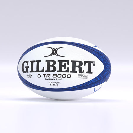 A navy Gilbert G-TR8000 Training Rugby Ball by Gilbert is displayed on a plain light background, featuring large black branding and text that identifies it as a size 5 ball crafted from durable rubber.