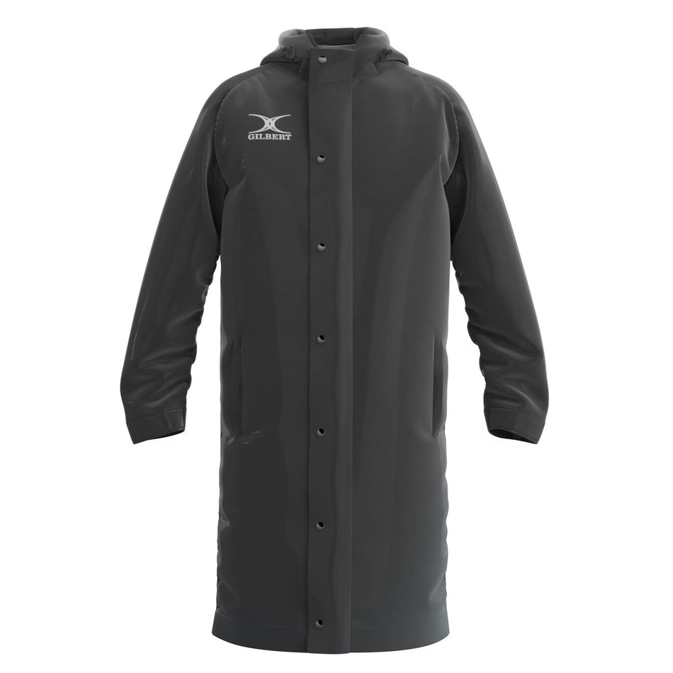 The black Gilbert TTS Touchline Jacket is a waterproof coat with a hood, snap-button front, two side pockets, and the Gilbert logo on the upper left chest—perfect for comfort in wet weather.