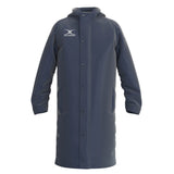 The Gilbert TTS Touchline Jacket is a long, dark navy waterproof coat with a hood, snap-button front, two side pockets, and the Gilbert logo on the chest.