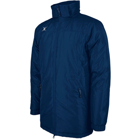 The Gilbert Pro All-Weather Jacket by Gilbert is a navy zip-up with long sleeves, high collar, two zippered side pockets, and a small white logo on the right chest.