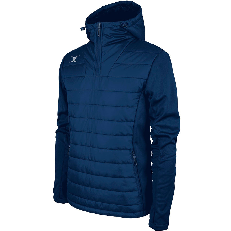 The Gilbert Pro Active Quarter Zip Jacket by Gilbert is a navy, hooded, quilted jacket with a half-zip front, zippered hand pockets, and a small white logo on the left chest. Smooth, breathable fabric adds comfort to the sleeves and side panels.