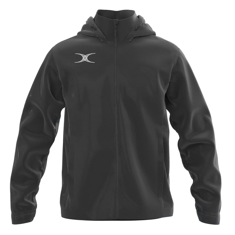 The Gilbert TTS Rain Jacket by Gilbert is a black hooded jacket with a front zipper, long sleeves, and two side pockets. It features a white crescent logo on the left chest and has a sleek, simple design.