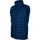 The Gilbert Pro Body Warmer by Gilbert is a sleeveless, navy quilted vest with a high collar, front zipper, two zippered pockets, and a small white logo on the upper left chest. Made from breathable technical fabric.