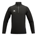 The Gilbert Atom 1/4 Zip Jacket by Gilbert is a black, lightweight outerwear with a high collar, two zippered pockets, and a white logo. Made from recycled polyester, its sleek design fits both sports and casual wear.