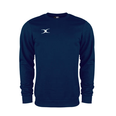 The Gilbert Atom Sweatshirt by Gilbert is a navy blue long-sleeve crewneck made from soft cotton fleece, featuring ribbed cuffs, hem, and a small white logo on the left chest. Displayed against a plain white background.