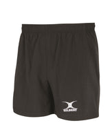 The Gilbert Virtuo Match Short by Gilbert features a black design with an elastic waistband, white Gilbert logo on the lower left leg, and is made of durable stretch ripstop fabric, shown against a white background.