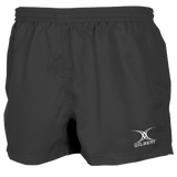 The Gilbert Saracen V3 Short – Junior is a plain black rugby short with an elastic waistband and a white Gilbert logo on the lower left leg, designed to be lightweight and durable for young athletes.