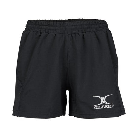 The Gilbert Photon Rugby Shorts Women by Gilbert are black, lightweight rugby shorts with an elastic waistband and a white Gilbert logo on the lower left leg. They have a simple design and are made from breathable, comfortable fabric.