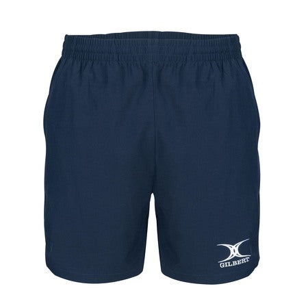 The Gilbert Photon Rugby Shorts Women, in navy, feature an elastic waistband, lightweight design, and a white Gilbert logo on the lower left leg.