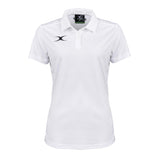 The Gilbert Womens Photon II Polo Shirt is a white short-sleeve performance polo with a collar, three buttons, and small black Gilbert logos on the left chest and inside the collar, shown against a white background.