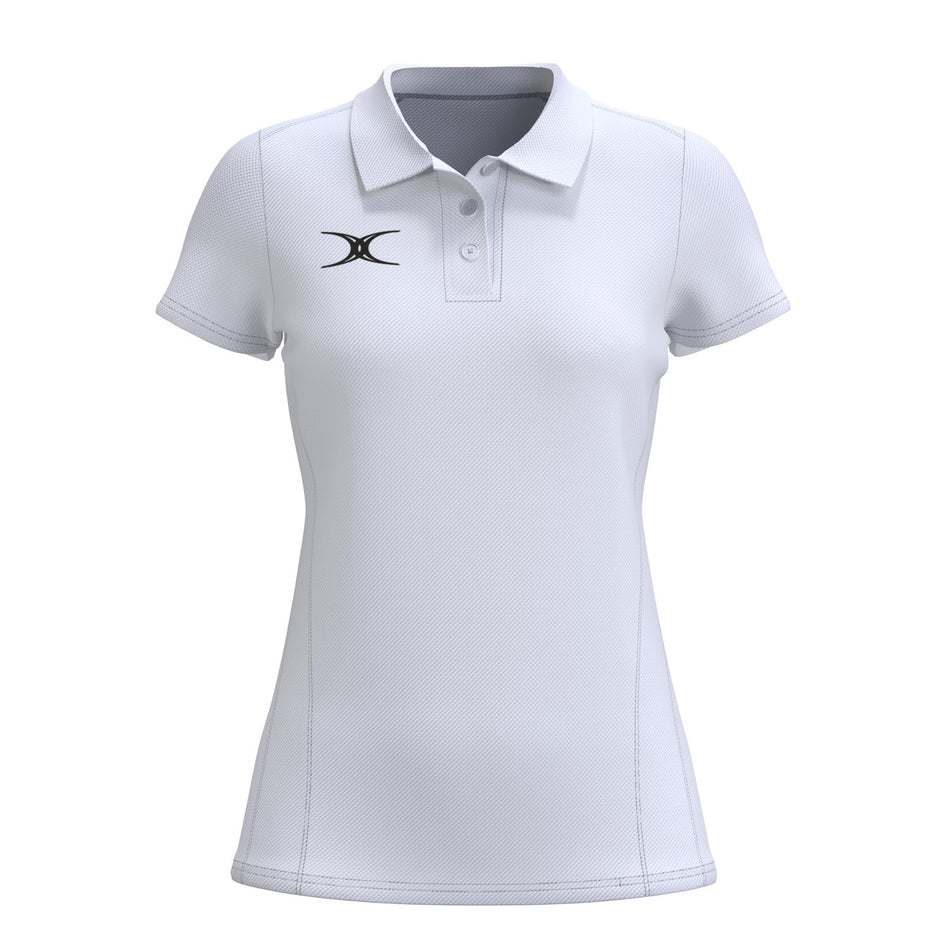 The Gilbert Atom Polo - Womens by Gilbert is a white, fitted casual polo with short sleeves, collar, three buttons, and moisture-wicking recycled polyester. It features subtle vertical stitching and a small black logo on the left chest.