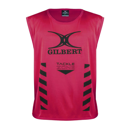 The Gilbert Tackle Zone Bib is a sleeveless red rugby training bib with "GILBERT" and "TACKLE ZONE" printed in black, black chevron stripes on both sides, and a large black logo—perfect for practicing tackle height regulations.