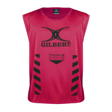 The Gilbert Tackle Zone Bib is a sleeveless red rugby training bib with "GILBERT" and "TACKLE ZONE" printed in black, black chevron stripes on both sides, and a large black logo—perfect for practicing tackle height regulations.