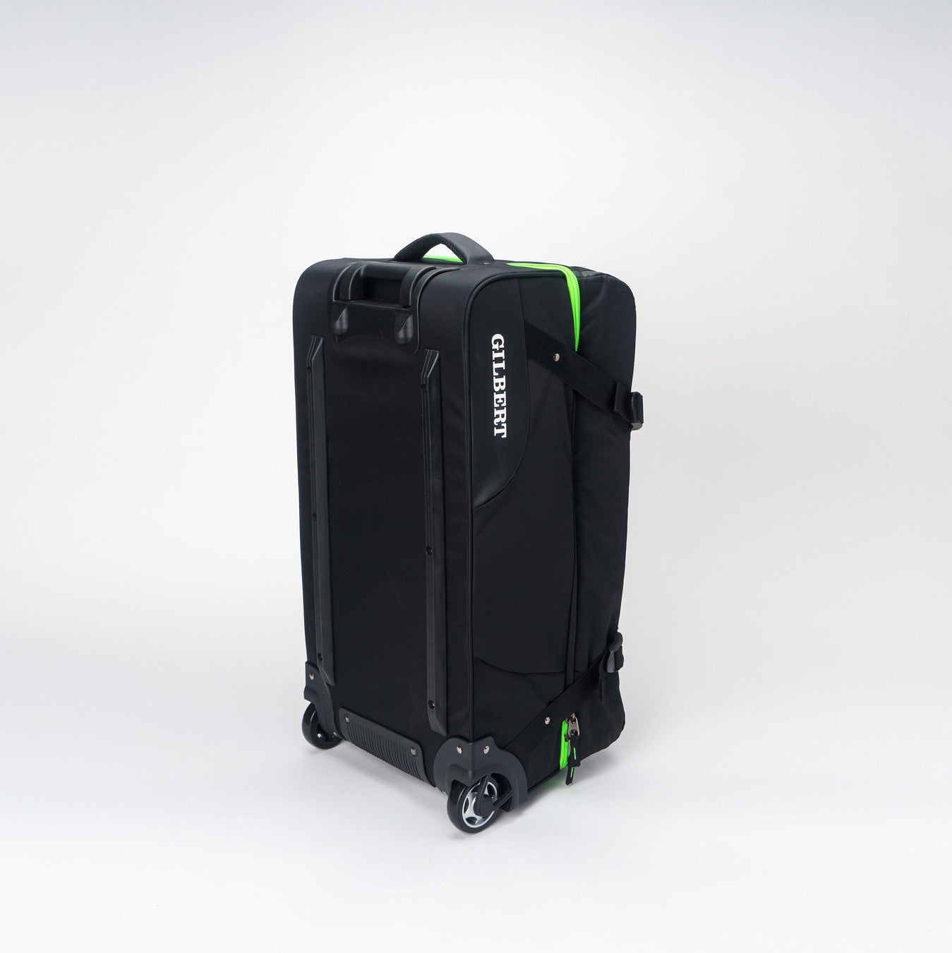 The Gilbert Club Tour Bag V4 is a large black wheeled rugby bag with a handle, green accents, and "GILBERT" printed vertically in white on the side, shown against a plain white background.