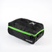 The Gilbert Flight Bag by Gilbert is black with a bright green zipper, sectioned storage, a top handle, and features the logo and name in white; shown on a white background.