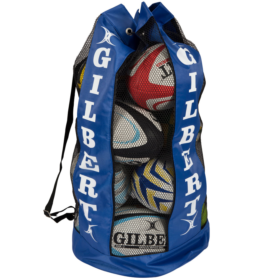 The Gilbert Breathable Ball Bag by Gilbert is a blue bag with mesh front for visibility, a black shoulder strap, and drawstring top, ideal for storing multiple rugby balls.