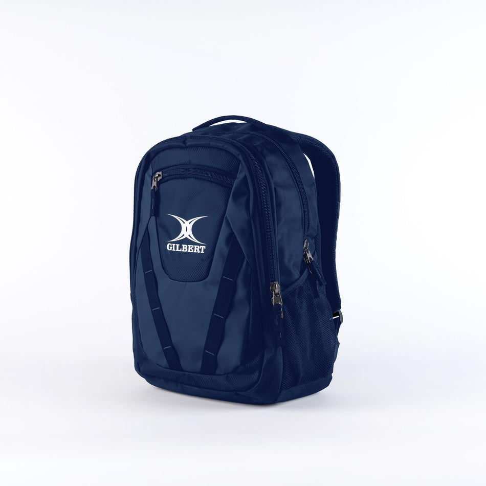 The Gilbert Club V4 Rucksack is a navy bag with multiple zippered compartments, black straps, and the white Gilbert logo on the front pocket, shown against a plain white background.
