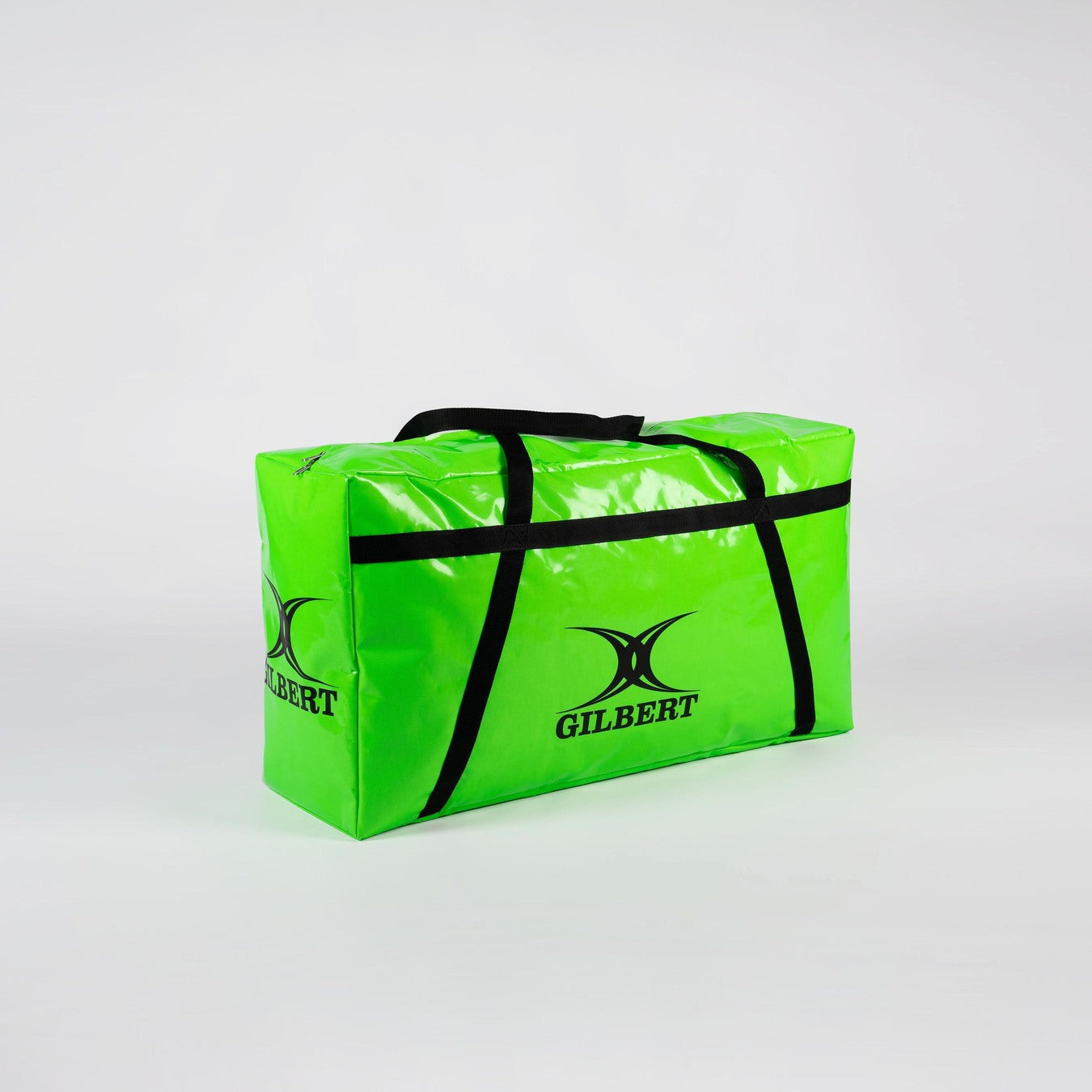 The Gilbert Rugby Equipment Bag is a bright green rectangular sports bag with black handles and trim, featuring the Gilbert logo and emblem on the side and end, shown against a plain light background.