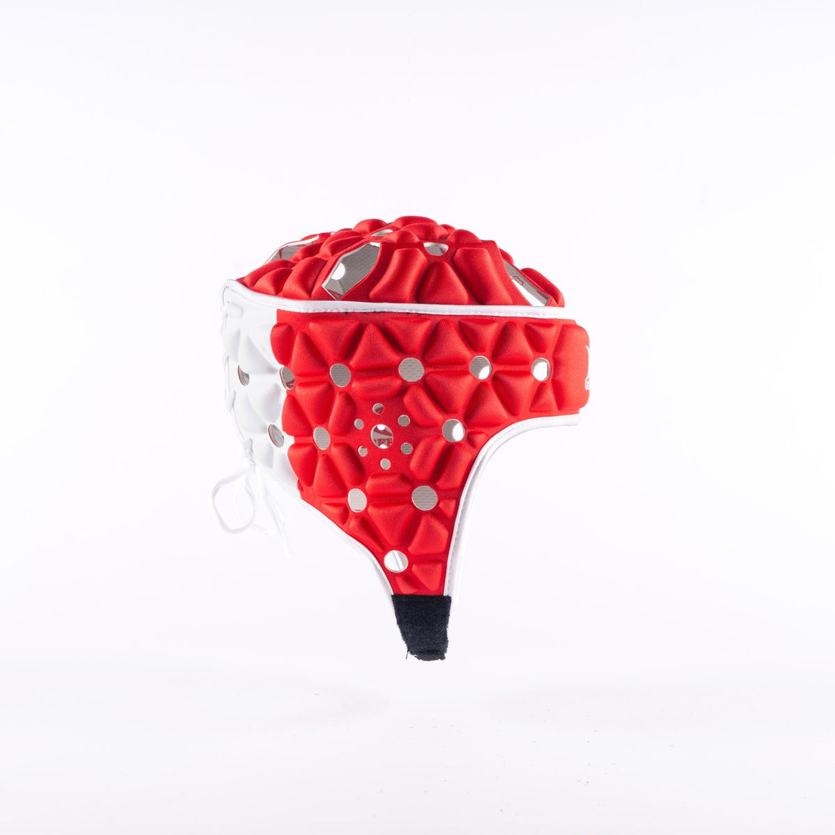 The Gilbert Air Headguard - Senior by Gilbert, featuring a red and white padded design with a geometric textured surface, is displayed against a plain white background.