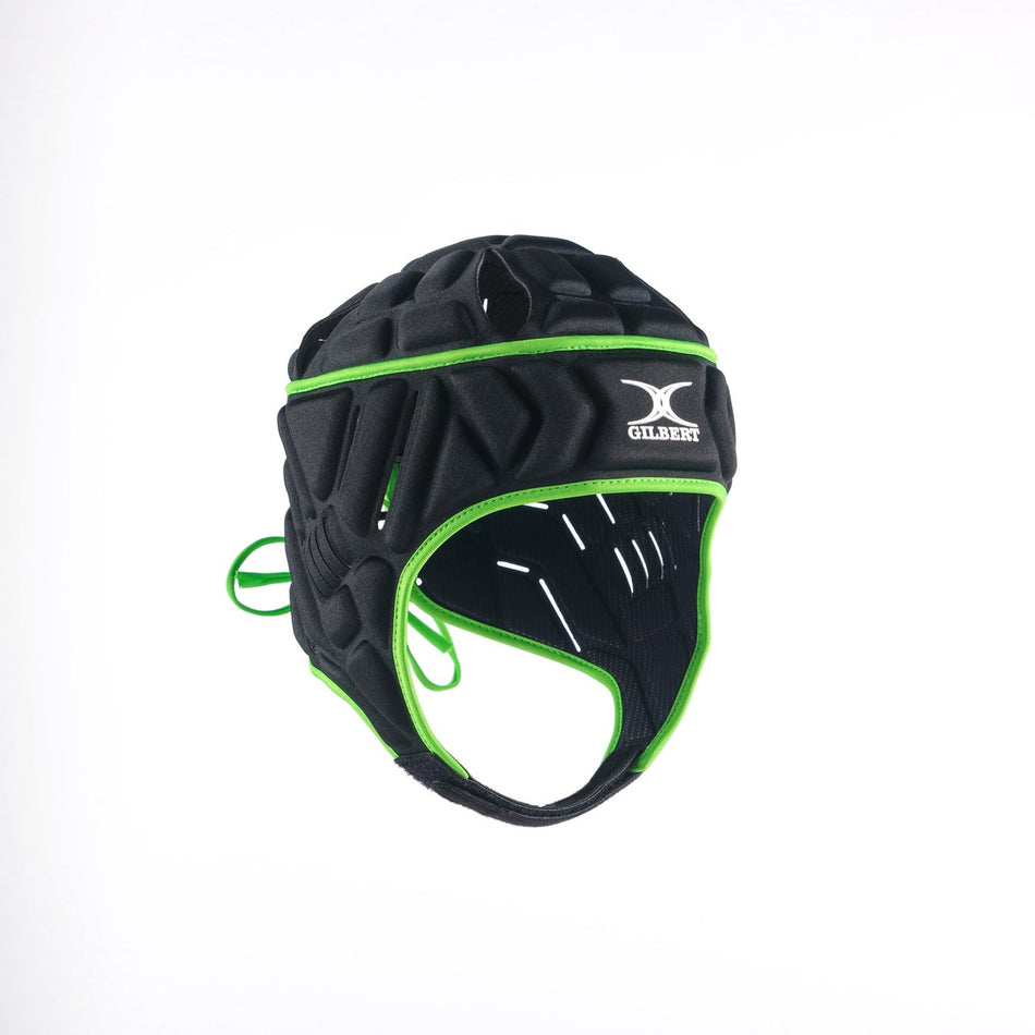 The Gilbert Vapour Junior Headguard is a black padded rugby headguard with the Gilbert logo on the front, offering great impact absorption and ventilation holes. Shown against a plain white background.
