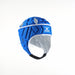 The Gilbert Vapour Junior Headguard by Gilbert, in royal blue with gray padding and chin strap, offers head protection, impact absorption, and ventilation holes. It is displayed against a plain white background.