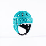 The Gilbert Octane Senior Headguard in Aqua/White features hexagonal padding, a white Gilbert logo on the front, and an adjustable lace closure, displayed against a plain white background.