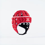 The Gilbert Octane Senior Headguard in red/white features black inner lining, white trim, and an adjustable lace closure, with the Gilbert logo on the front, shown isolated on a plain white background.