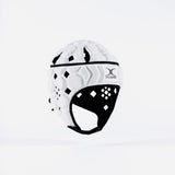 The Gilbert Octane Senior Headguard by Gilbert, in White/Black, features black inner padding, diamond-shaped vents, an expandable lace closure, and the Gilbert logo on front. It is displayed against a plain white background.