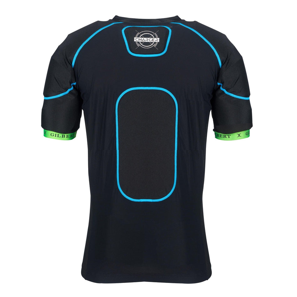 The Gilbert Charger X1.1 Body Armour - Senior is a black short-sleeve athletic shirt by Gilbert, featuring blue piping, a central rectangular high-density foam padded area on the back, and green sleeve bands with "GILBERT" branding.