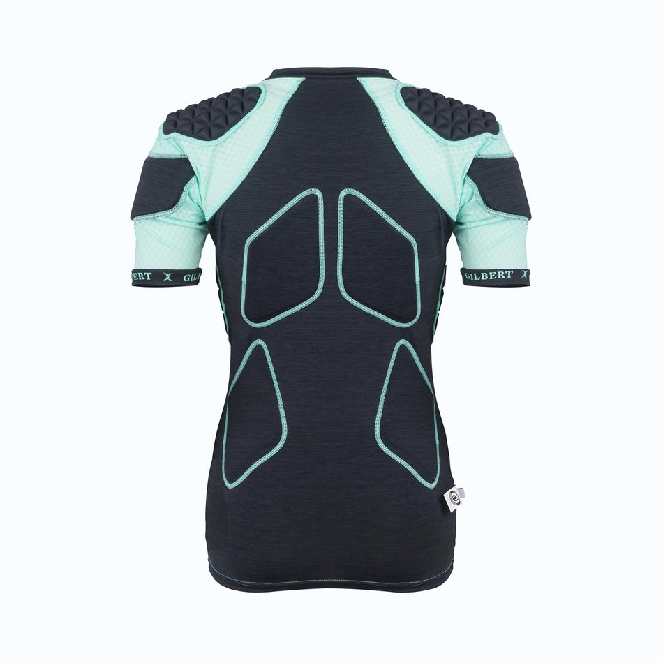 The Gilbert Triflex Lite V2 Womens Body Armour is a black, short-sleeve sports shirt with light teal padded shoulders and upper arms. It features Triflex Lite impact protection, outlined padding on the back and sides, and a fitted design for women’s rugby.