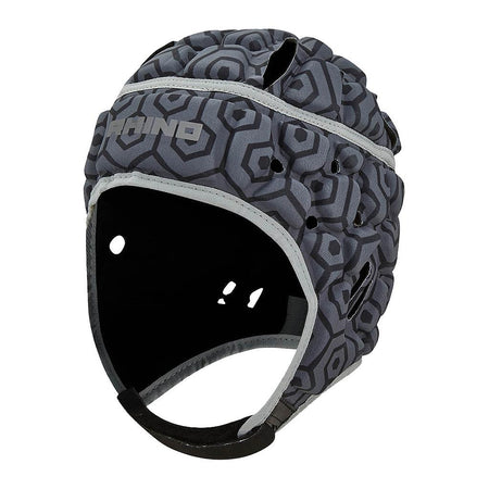 The Rhino Pro Head Guard Adult by Rhino is a lightweight black scrum cap featuring closed cell foam padding, ventilation holes, a chin strap, and a geometric pattern for enhanced head protection in contact sports.
