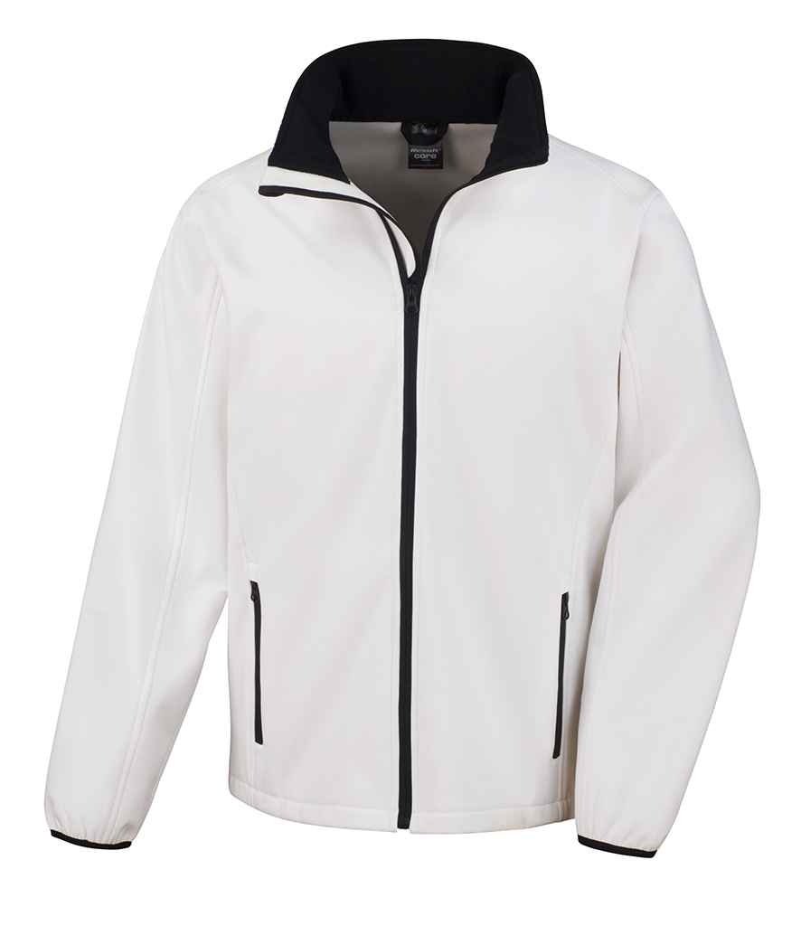 The Result Soft Shell Umpire Jacket by Result features a white zip-up design with black trim, high collar, black zipper, two front zippered pockets, and elastic cuffs. Displayed against a plain white background.