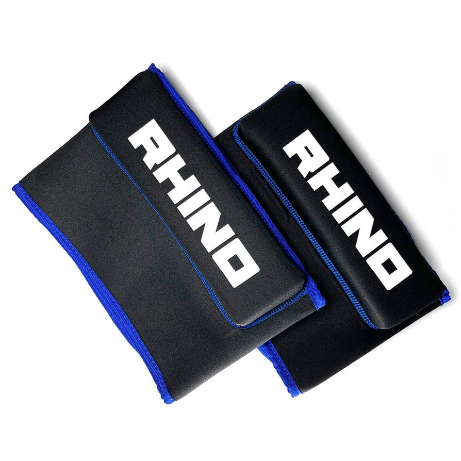 Two black and blue Rhino Pro Lifting Pads by Rhino, made from neoprene elastic fabric with "RHINO" in bold white letters, are shown side by side on a white background—ideal for training sessions.