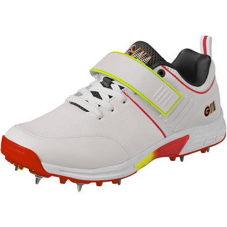 The Gunn & Moore Rival+ Cricket Spikes by Gunn & Moore are white athletic cricket shoes with steel spikes, red and yellow accents, black inner lining, and a velcro strap, designed for high-performance play on grass or turf.