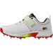The Gunn & Moore Rival+ Cricket Spikes by Gunn & Moore feature a white design with red and yellow accents, steel spikes for superior grip, lace-up front, Velcro strap over the laces, and bold GM branding—ideal for serious cricketers.
