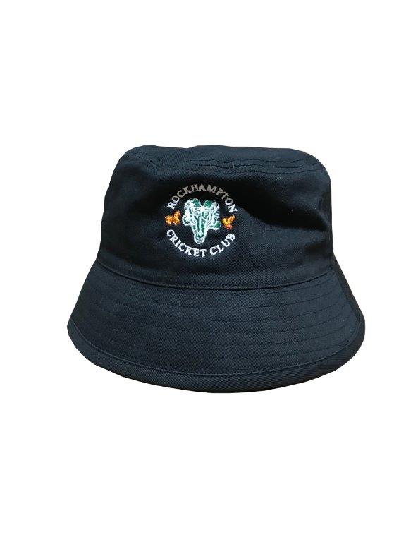 The Breathable Bucket Hat by Martin Berrill Sports is a black polyester twill hat with a green and orange embroidered Rockhampton Cricket Club logo on the front. This customizable hat is shown against a plain white background.