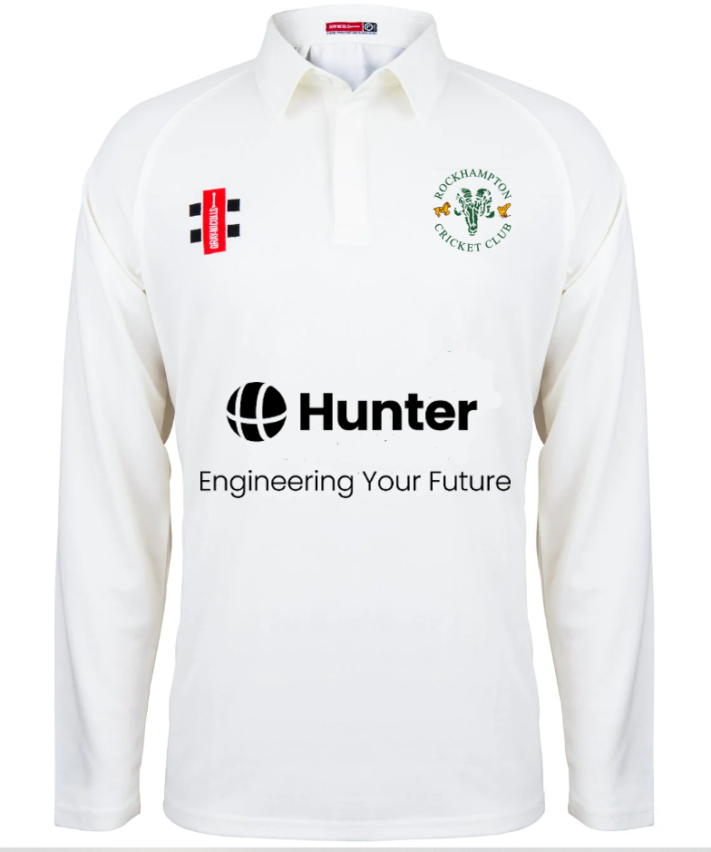 The Gray Nicolls Rockhampton CC Matrix V2 Long Sleeved Playing Shirt - Junior is a white, breathable cricket shirt with the club logo on the left chest and sponsor logos including a large Hunter Engineering logo on the front for field comfort.