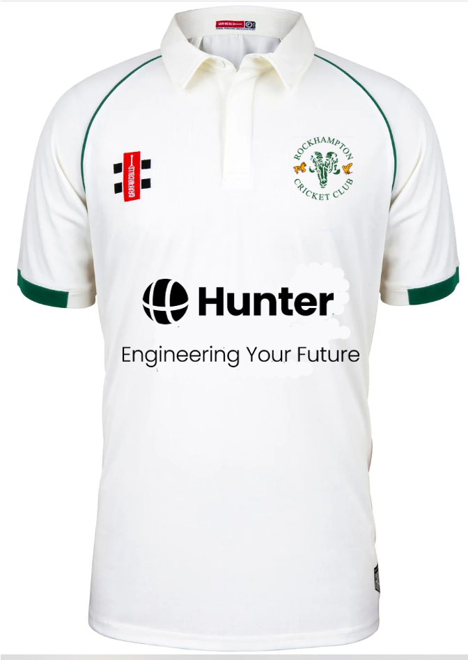 The Rockhampton CC Matrix V2 Playing Shirt - Junior by Gray Nicolls is a white shirt with green trim, displaying the club logo, the Hunter logo with "Engineering Your Future" tagline, and other sponsor logos on chest and sleeve.