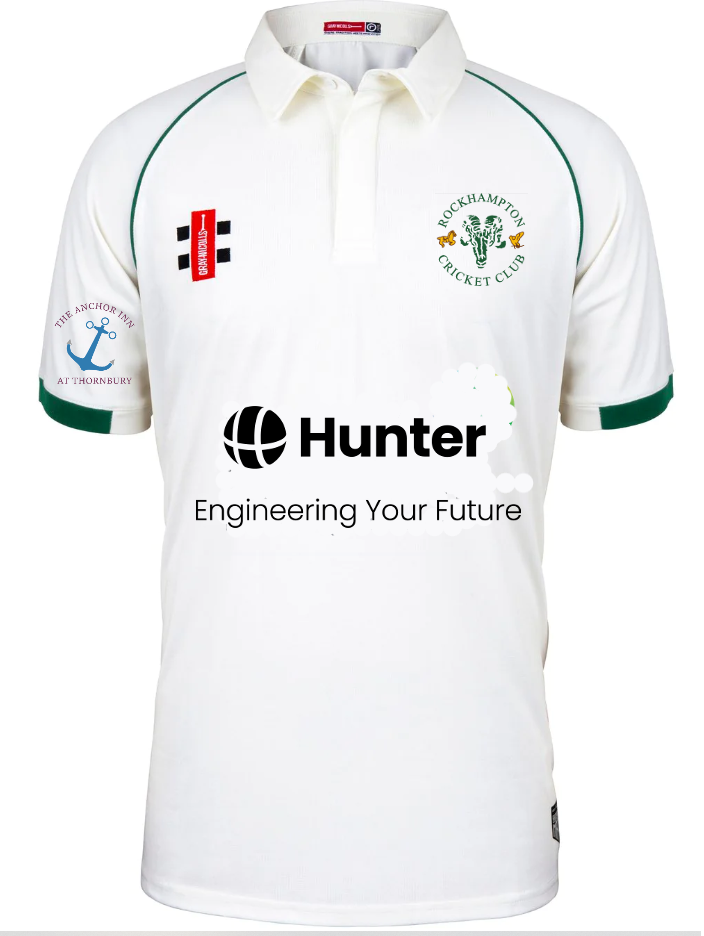 The Gray Nicolls Rockhampton CC Matrix V2 Playing Shirt – Senior is a white cricket shirt with green trim, moisture control, the club logo on the chest, sponsor logos including Hunter: Engineering Your Future, and an anchor sleeve logo.