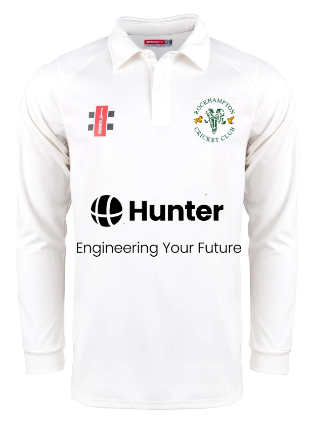 The Gray Nicolls Rockhampton CC Pro Performance V3 Long Sleeve Shirt – Junior, in white, features the Rockhampton Cricket Club logo on the chest and front sponsor logos, including Hunter Engineering Your Future.