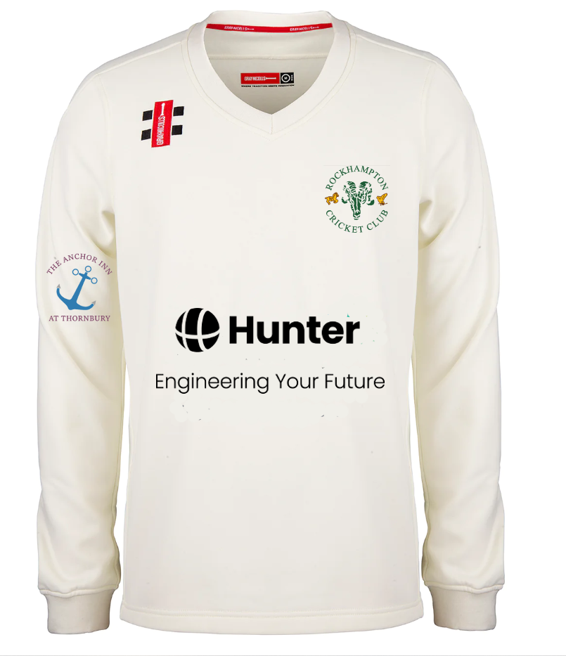 The Gray Nicolls Rockhampton CC Pro Performance Sweater - Senior features a cream color, club logo on the left chest, Hunter sponsor on the front, and “The Anchor Inn at Thornbury” on the right sleeve—perfect for dedicated cricket fans.