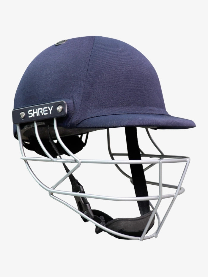 The Shrey Classic 2.0 Steel Helmet - Junior is a blue cricket helmet with rear adjuster, metal face guard, and SHREY branding on the side. Made from an ABS composite shell, it is displayed against a plain white background.