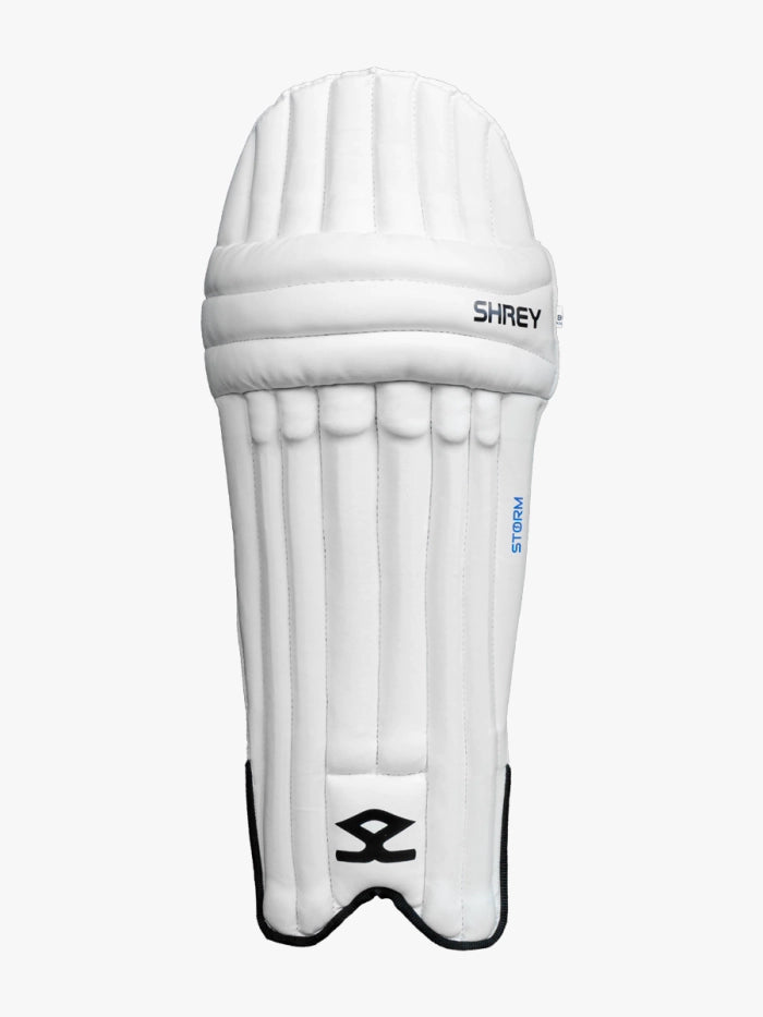 A white Shrey cricket batting leg guard with vertical padding and a black logo—perfect for pairing with your Shrey Storm Cricket Set (Kashmir Willow) or completing your gear.