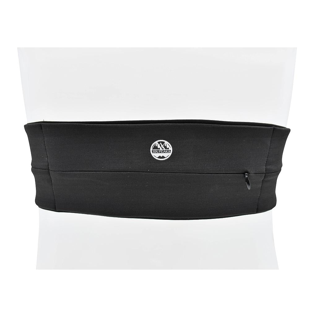 The Six Peaks Running Slim Lightweight Waistband, a black belt with a small zippered pocket and circular mountain logo, is shown against a white background.