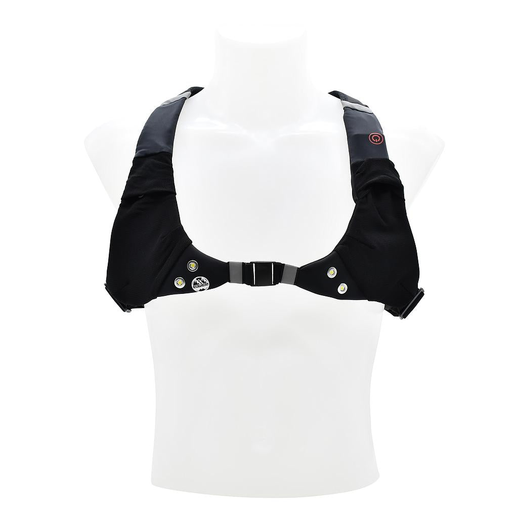 The Six Peaks LED Sport Vest by Six Peaks is a black rechargeable safety vest with shoulder straps, a front buckle, small buttons, and a power symbol for visibility and functionality, shown on a white headless mannequin torso.
