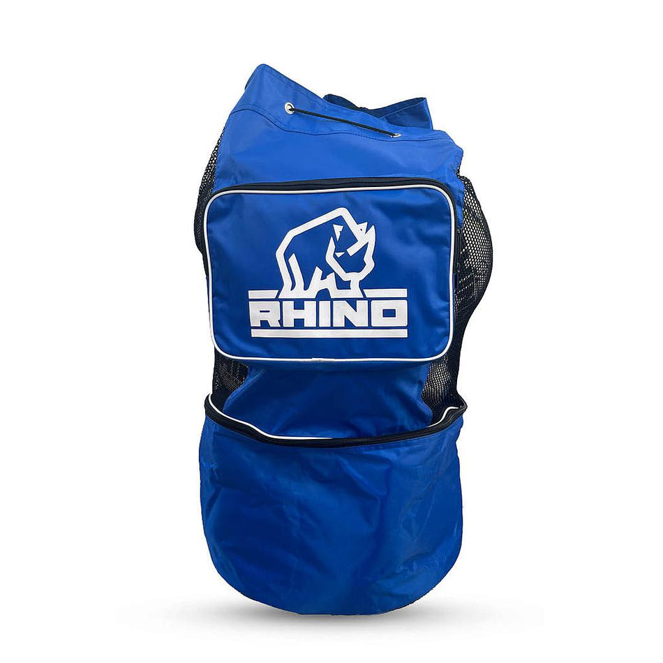 The Rhino Coaches Ball Bag is a large blue bag with mesh sides, a zippered bottom compartment, front pocket showing the white Rhino logo and brand name, and ample ball storage—perfect for sports coaches.